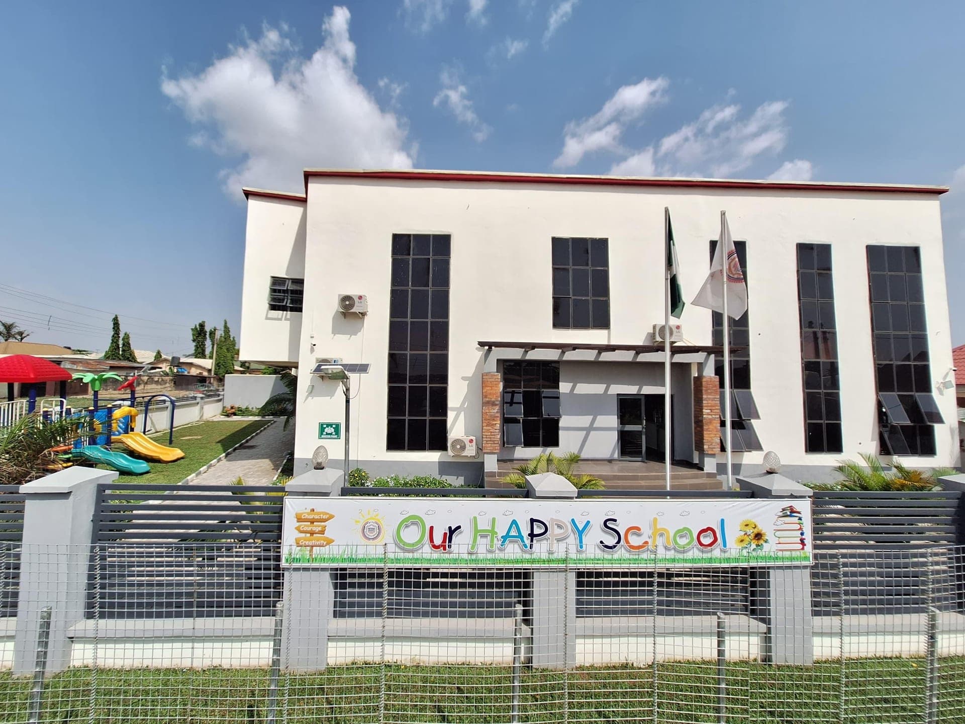 The school frontage and main gate on a bright morning