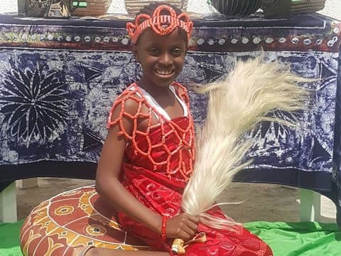 A pupil in traditional dress on Cultural Day