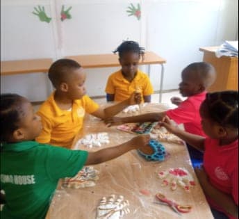 Children making models at the craft table