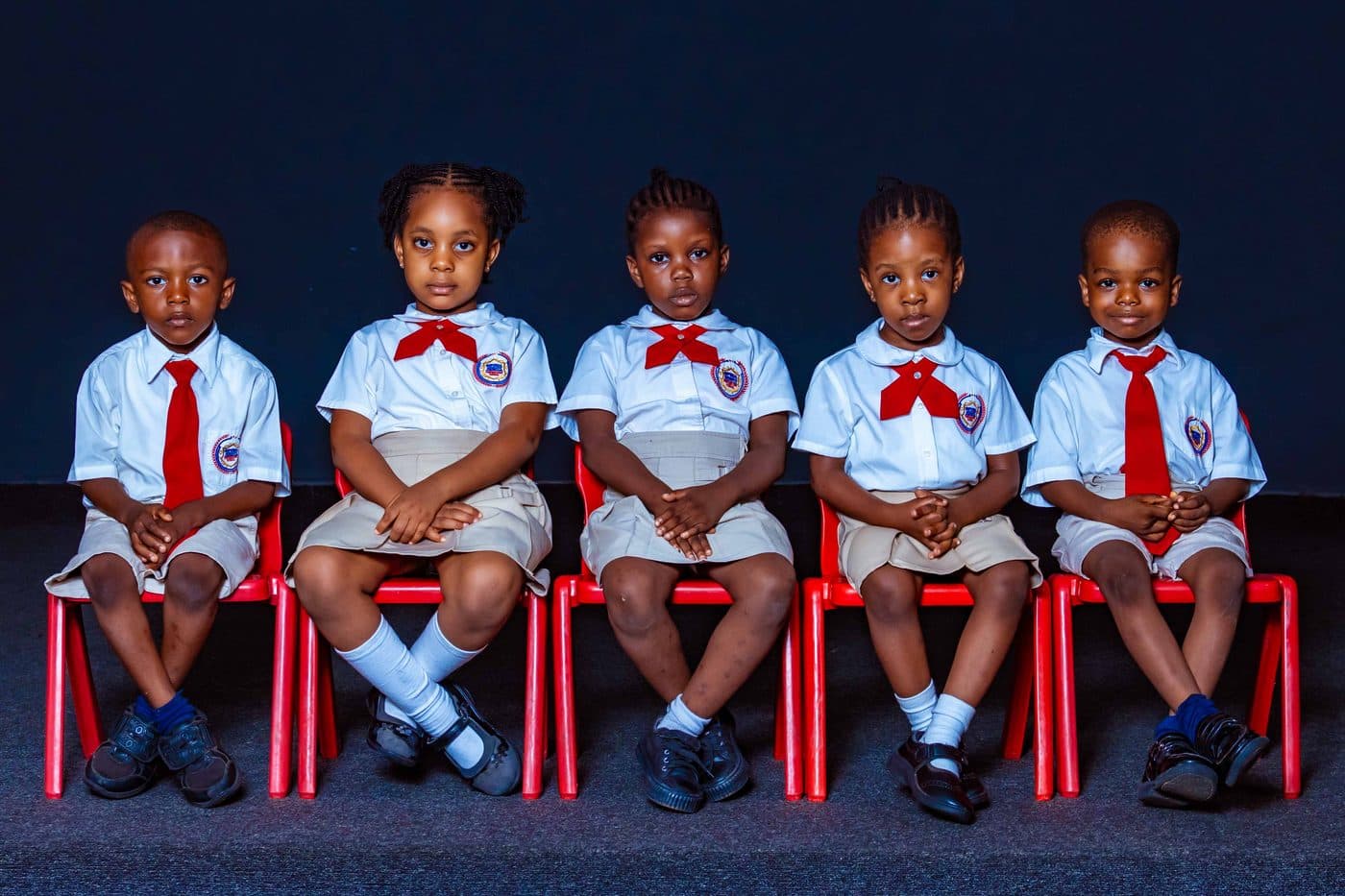 Pupils seated in rows for their class photograph