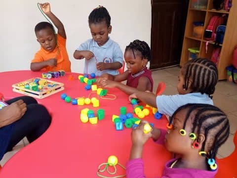 Building with construction toys at the table