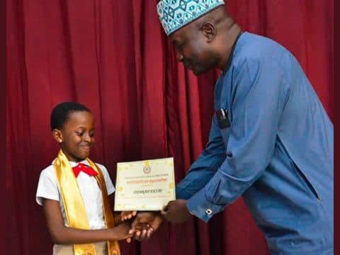 Receiving an award at prize-giving