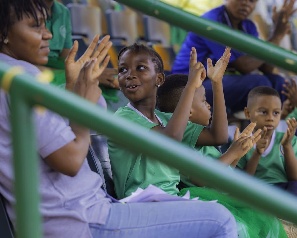 Zuma House cheering from the sideline