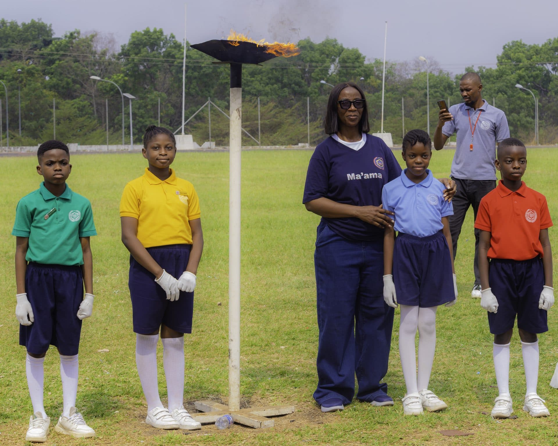 The school team on the field before an athletics meet