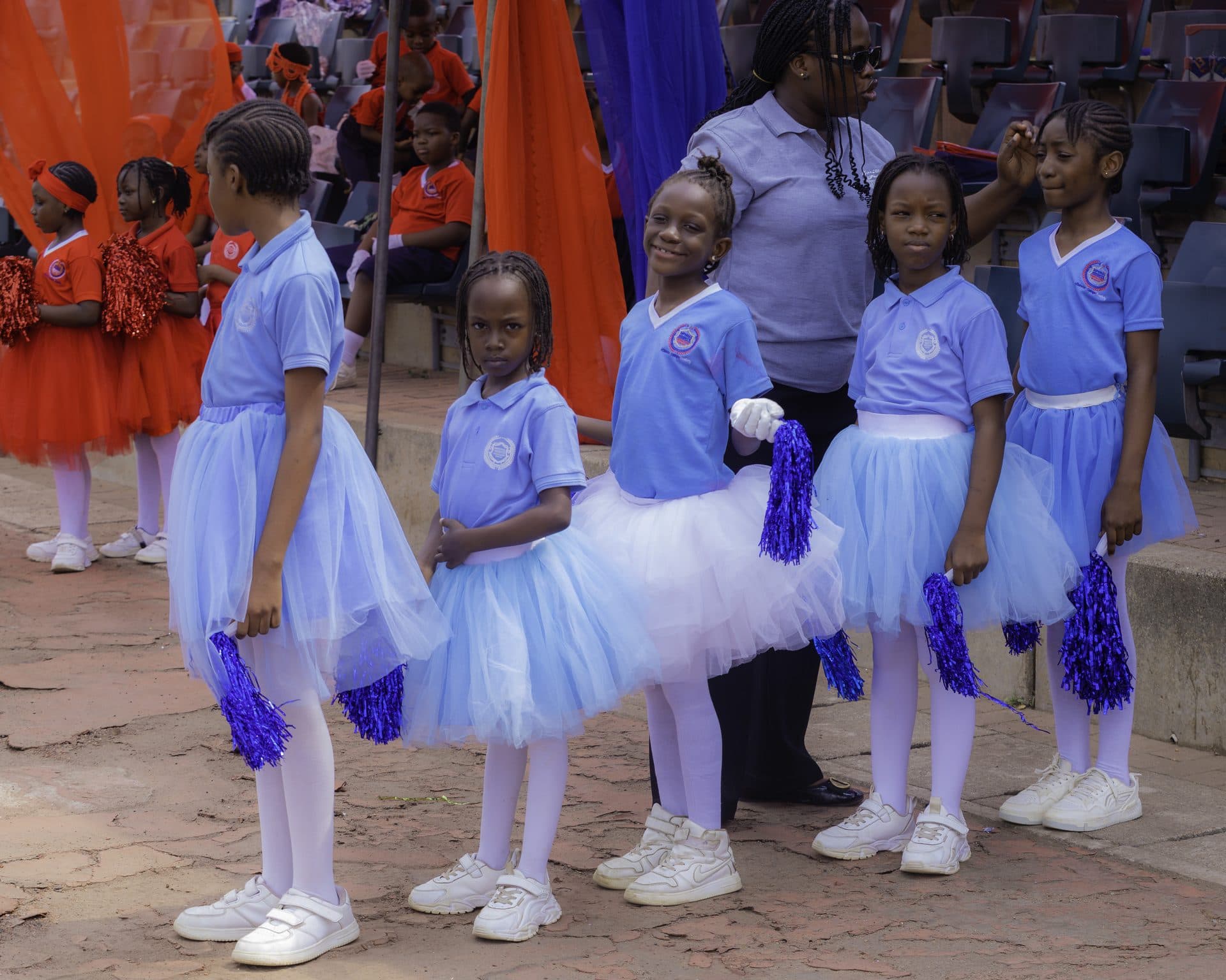 A display team performing in blue and white