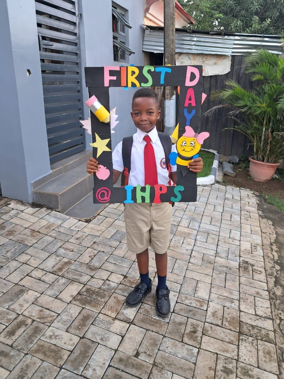 A pupil on his first day back at school