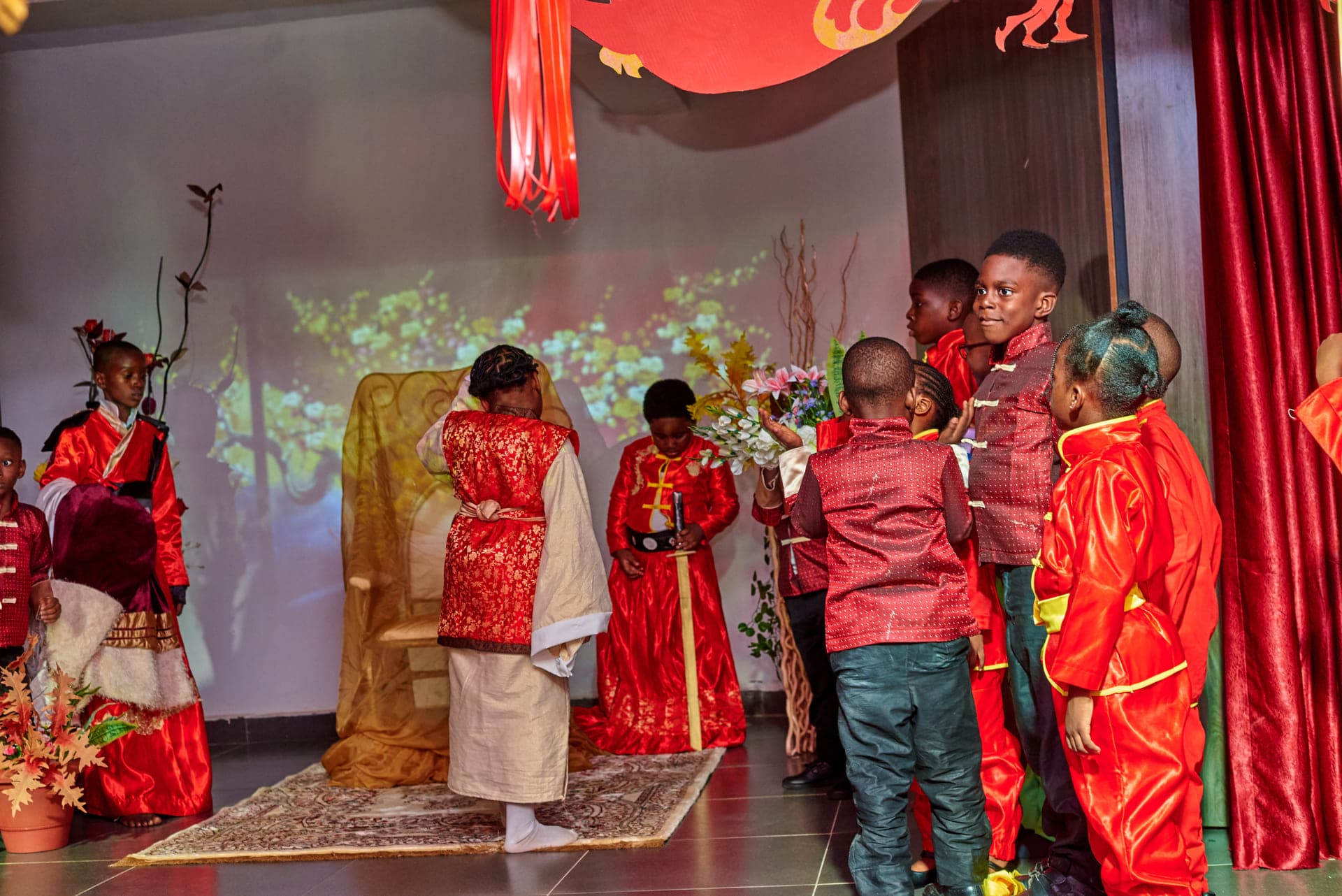 The closing court scene of the Cultural Day play, the whole cast on stage