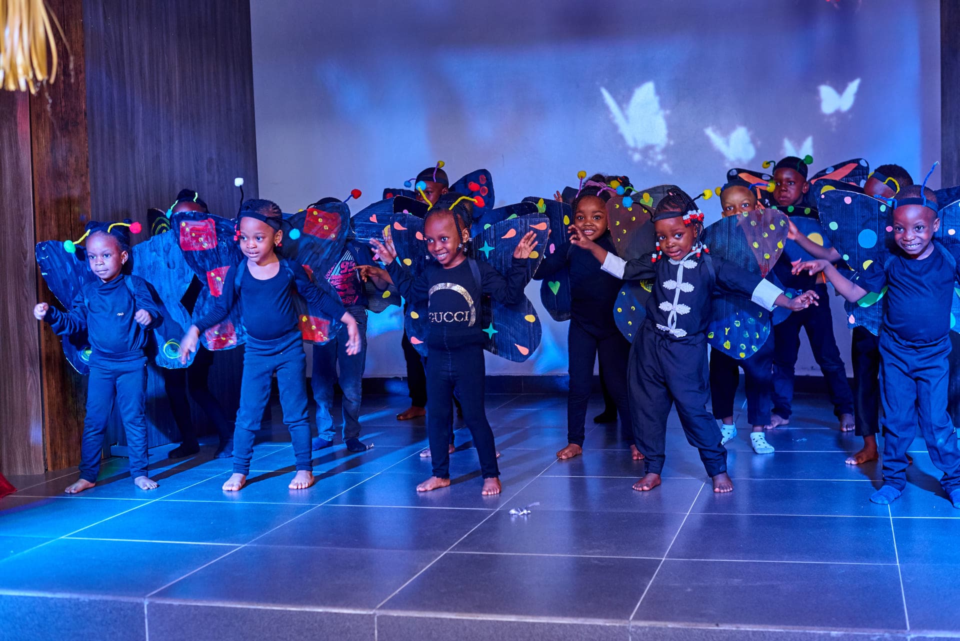 The whole ensemble dancing together in the Cultural Day finale