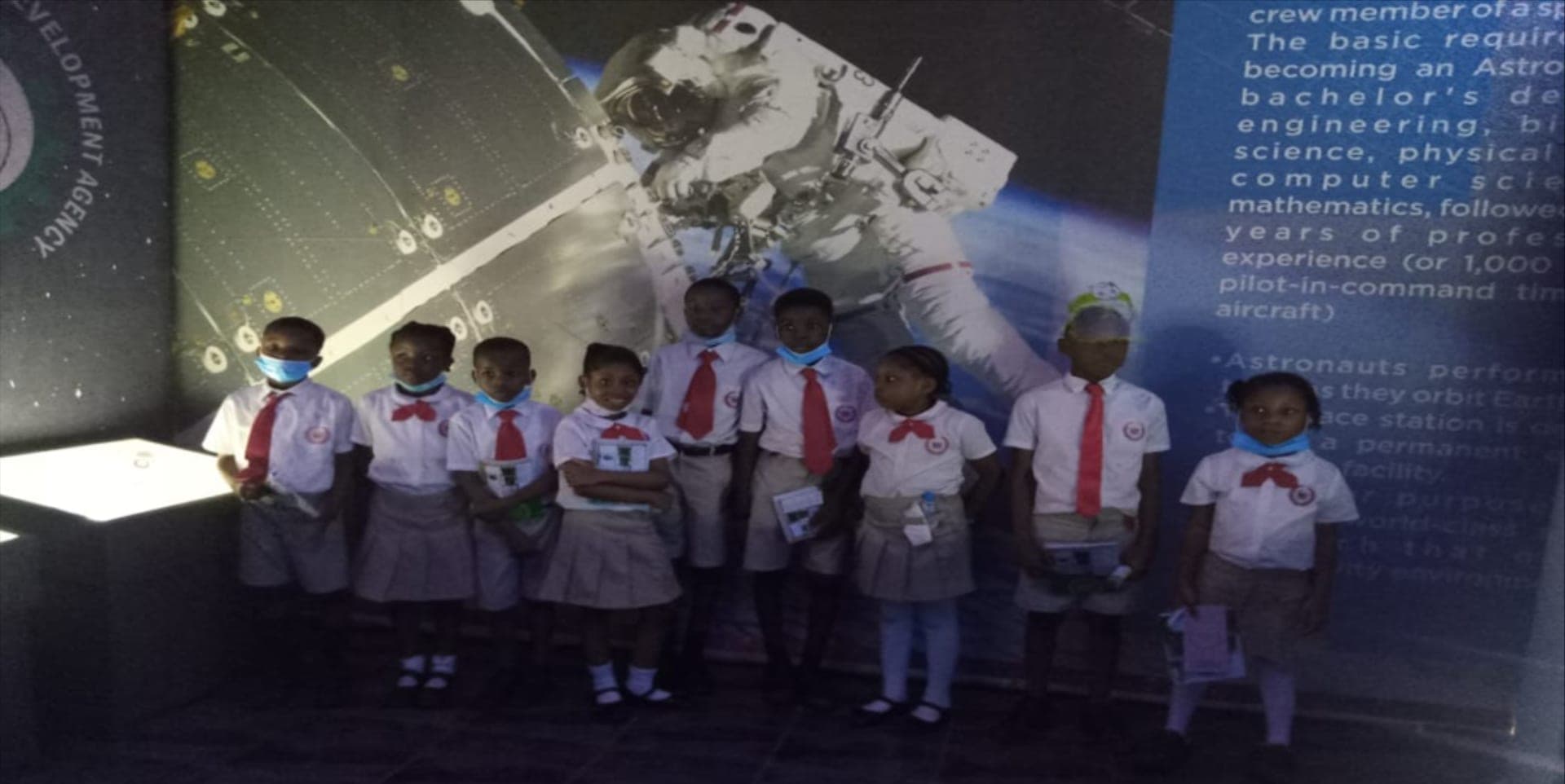 Pupils exploring a space and astronaut exhibition